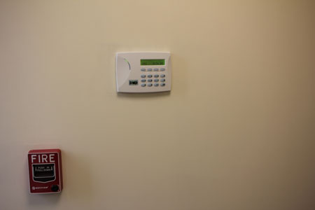 A single system with alarms, cameras, and access management integrated is ideal for most businesses.