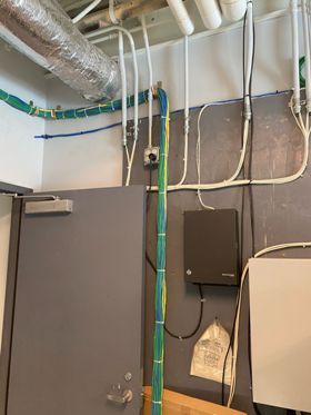 Structured cabling installation from electricity room leading to end-user equipment